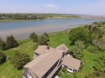 Aerial of house with views of Fort Hill, Nauset Marsh, Nauset Light and the Atlantic Ocean